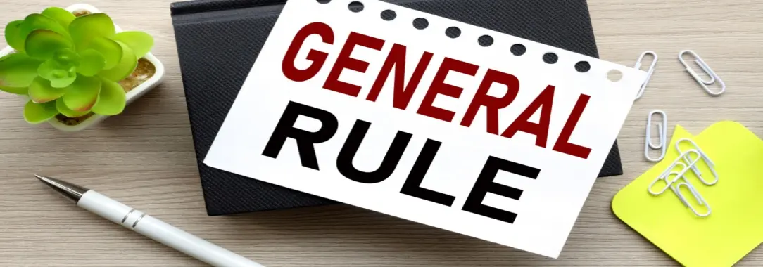 An image of a wooden desk with pen, succulent, black notebook, 'GENERAL RULE' note in red/black, yellow paper with clips.
