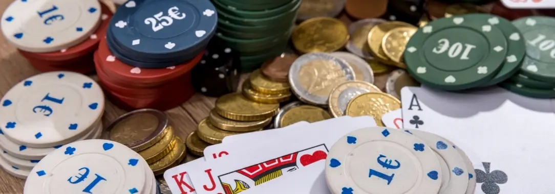 a montage of poker chips , cards, and money